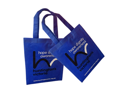 Woman walking through a gym entrance with a blue bag